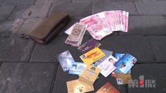 送孩子就医却掉了钱包 好心环卫大姐主动归还